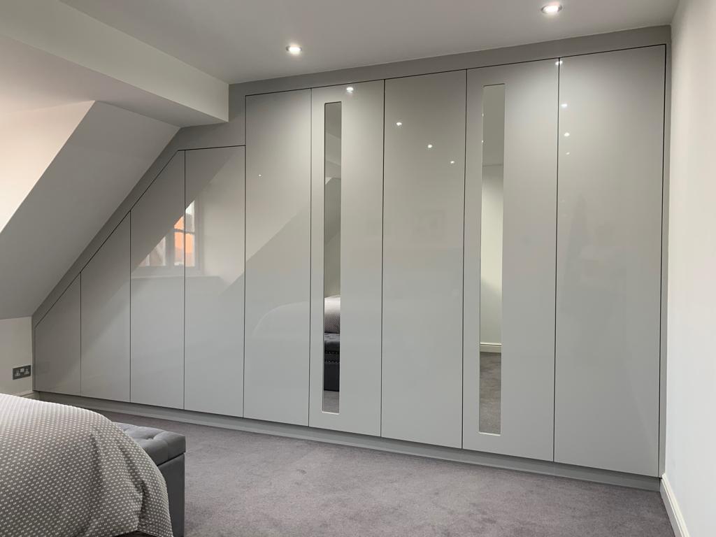 Bespoke Angled Wardrobe units & Doors - Gloss Light Grey and Mirror